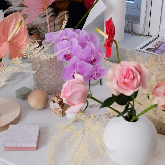 An assortment of flowers that were used on set of the shoot for Glossier